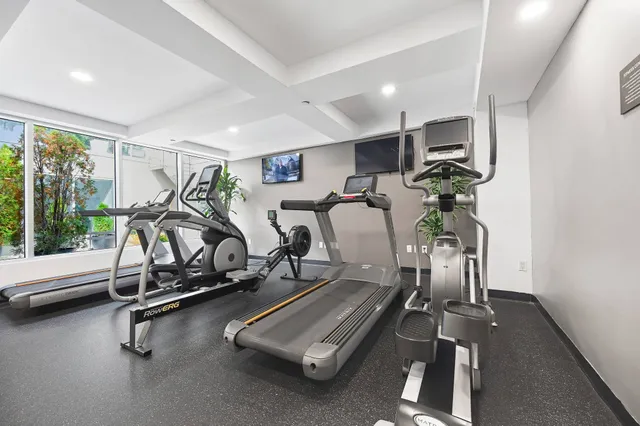 a view of a room with gym equipment