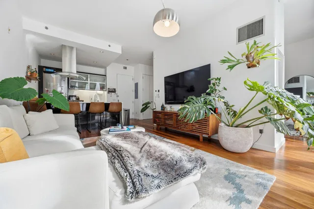 a bedroom with a bed and a view of bathroom