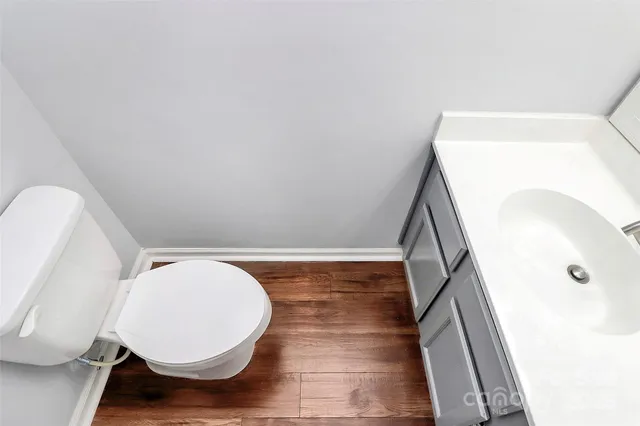 a bathroom with a sink and mirror
