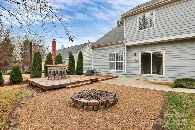 a front view of a house with a yard and a garage