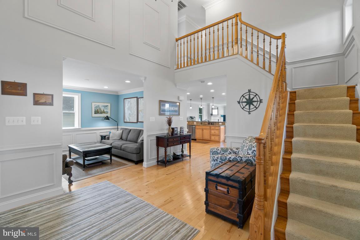 8100 Main Creek Road Pasadena, MD 21122 - Photo 21 of 40 A two-story foyer greets every guest