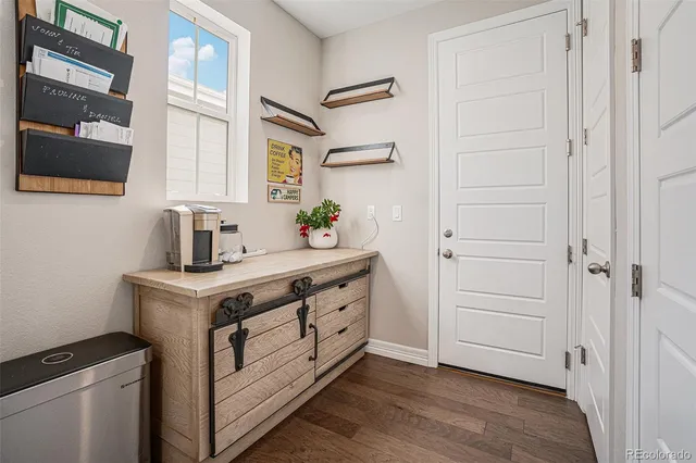 a view of cabinets and wooden floor