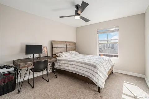 a bathroom with a sink toilet and mirror