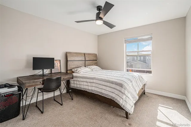 a bathroom with a sink toilet and mirror