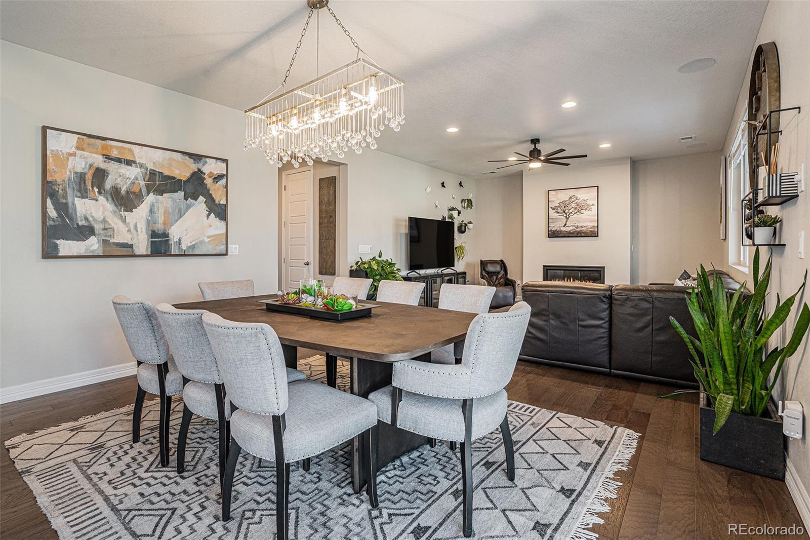 22011 East Stanford Circle Aurora, CO 80015 - Photo 7 of 43 a view of a dining room with furniture
