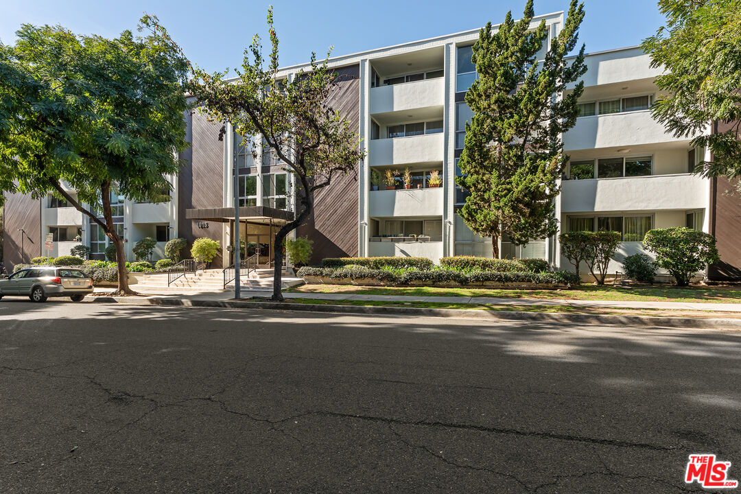 1015 North Kings Road, Unit 110 West Hollywood, CA 90069 - Photo 28 of 36 a view of street with a house