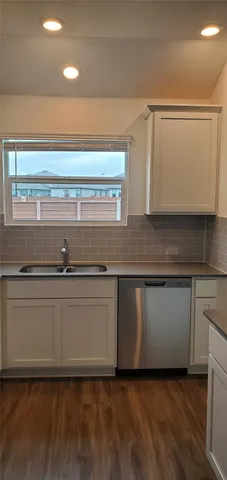 a close view of appliances and cabinets in a room