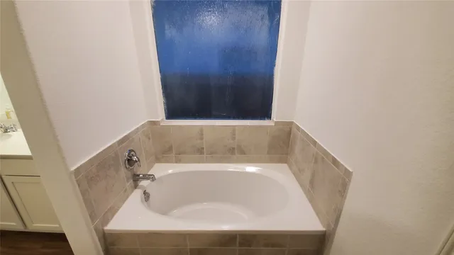 a bathroom with a bathtub