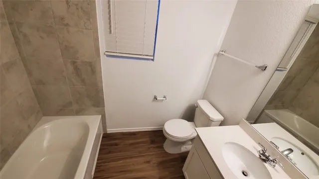 a bathroom with a sink and a toilet