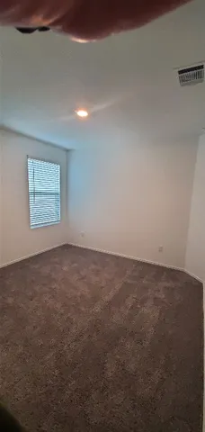 en empty room with windows