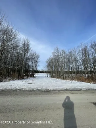 a view of road with a building