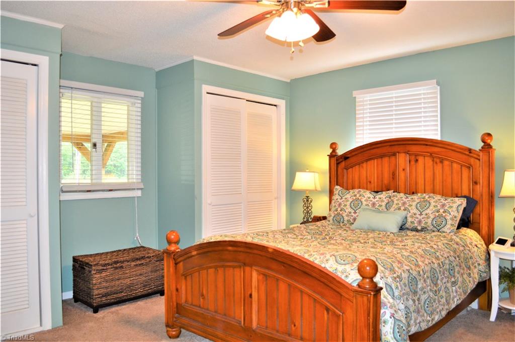 170 Baker Crossroad Road Madison, NC 27025 - Photo 16 of 30 Master Bedroom: (main level). His/Hers closest