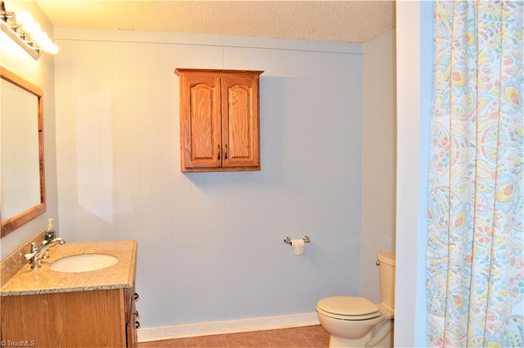 170 Baker Crossroad Road Madison, NC 27025 - Photo 25 of 30 Basement: 2nd Full Bathroom