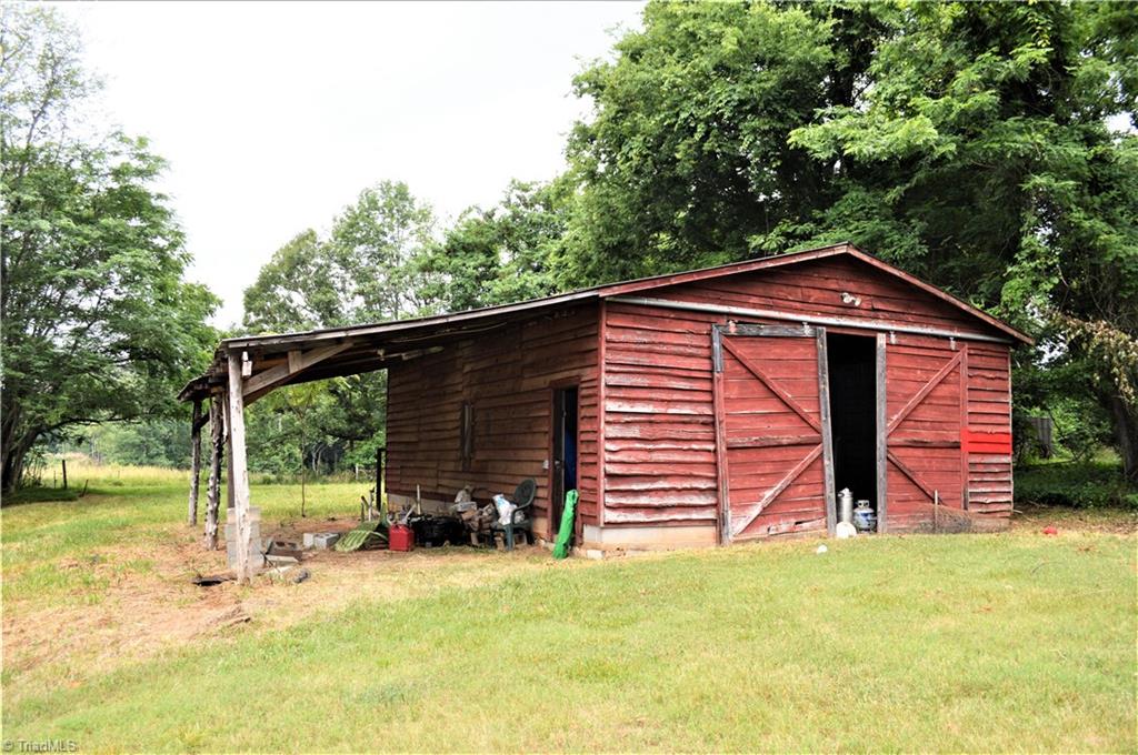 170 Baker Crossroad Road Madison, NC 27025 - Photo 30 of 30 Barn: Separate Power meter, cement floor, wood-stove, lien-to