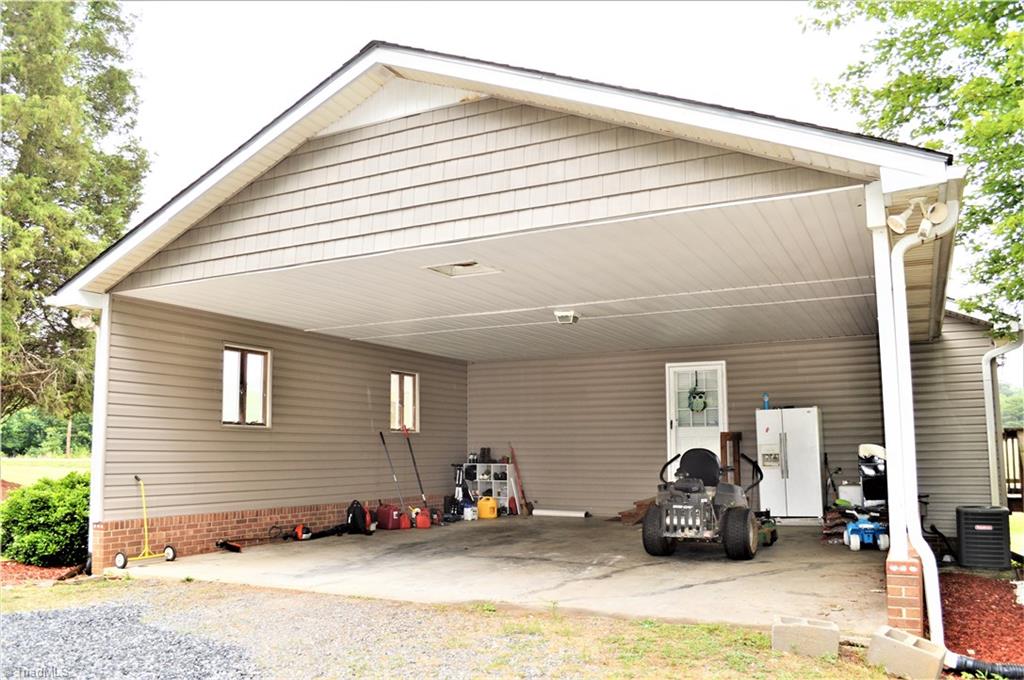 170 Baker Crossroad Road Madison, NC 27025 - Photo 5 of 30 Large (26' x 26') Carport