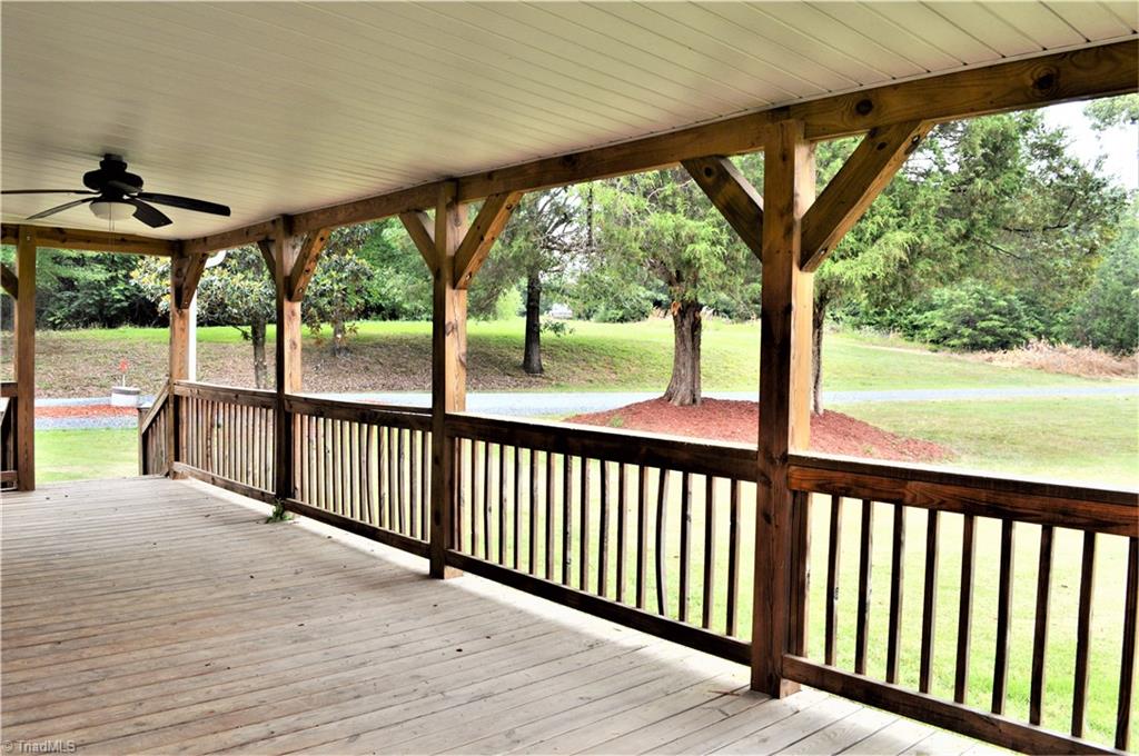 170 Baker Crossroad Road Madison, NC 27025 - Photo 6 of 30 Amazing 32' x 12' covered porch!