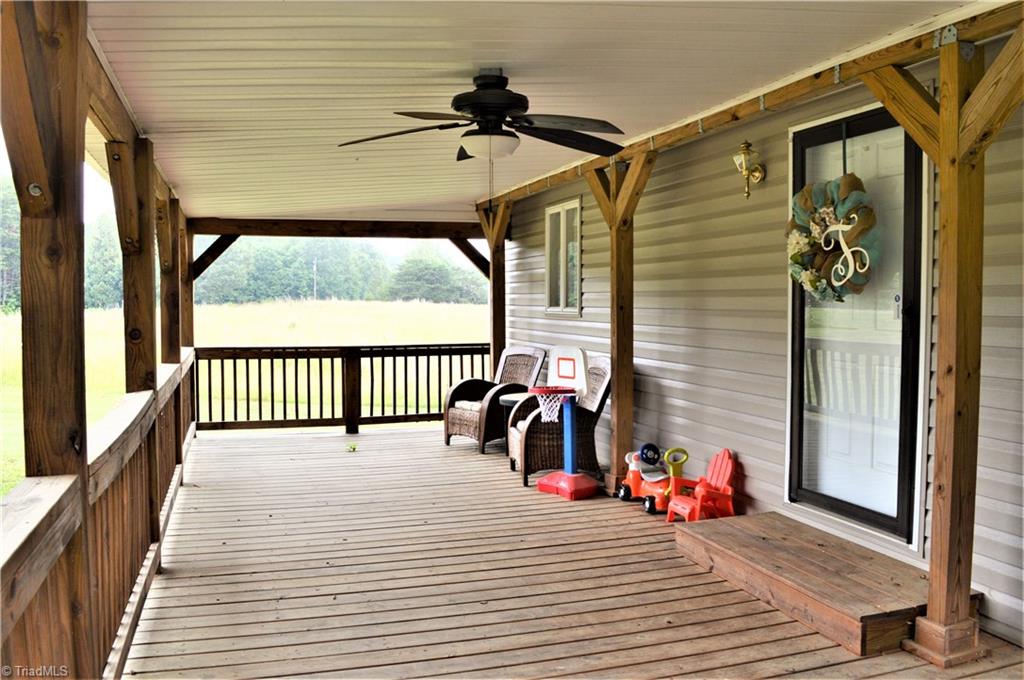 170 Baker Crossroad Road Madison, NC 27025 - Photo 7 of 30 Amazing 32' x 12' covered porch!