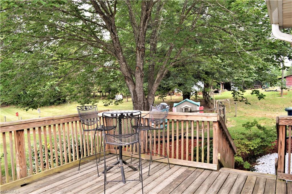 170 Baker Crossroad Road Madison, NC 27025 - Photo 8 of 30 Deck overlooking expansive yard!