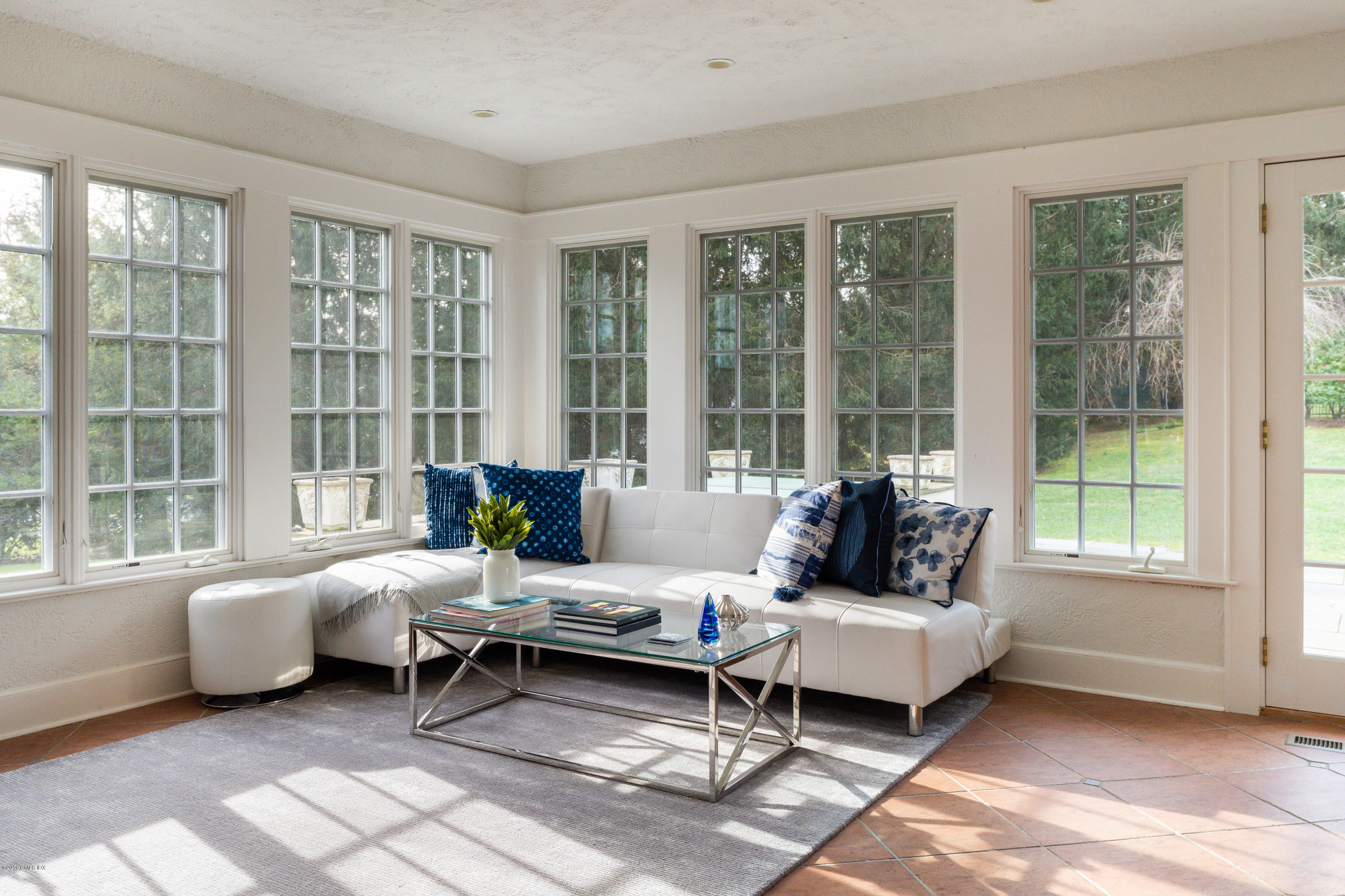 50 Upland Drive Greenwich, CT 06831 - Photo 12 of 34 a living room with furniture and a large window