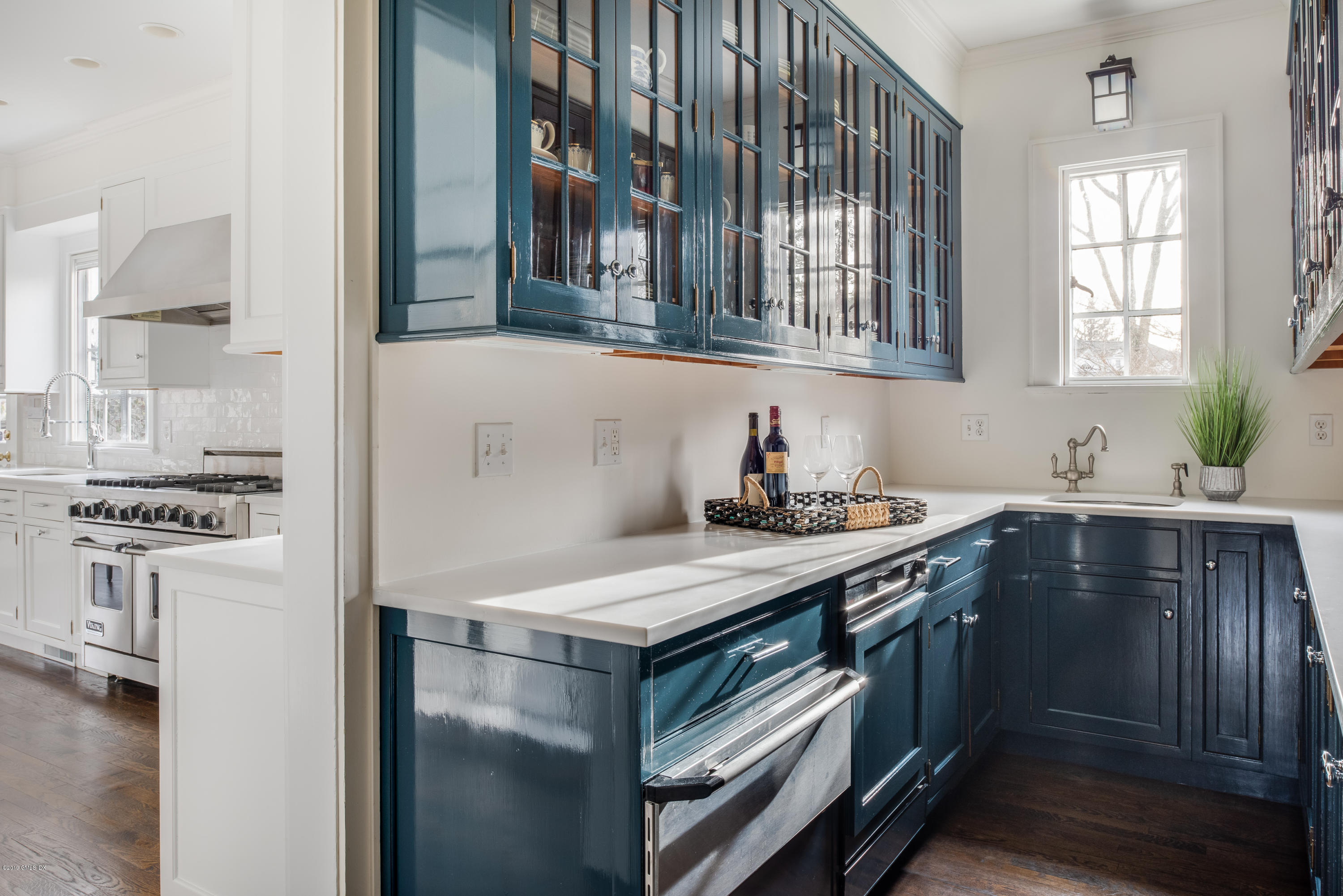 50 Upland Drive Greenwich, CT 06831 - Photo 15 of 34 a kitchen with stainless steel appliances granite countertop a stove and a sink