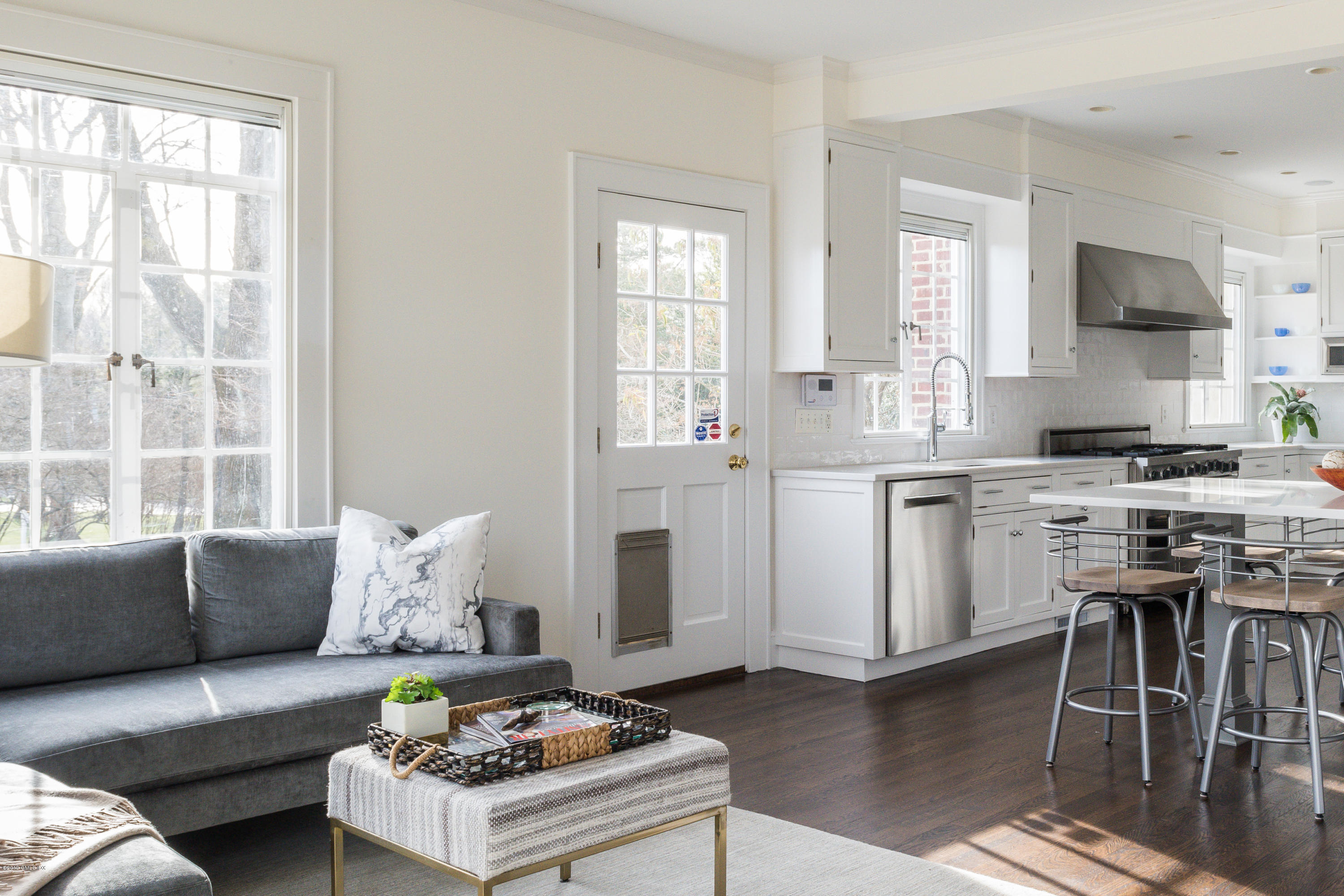 50 Upland Drive Greenwich, CT 06831 - Photo 18 of 34 a living room with furniture and a table