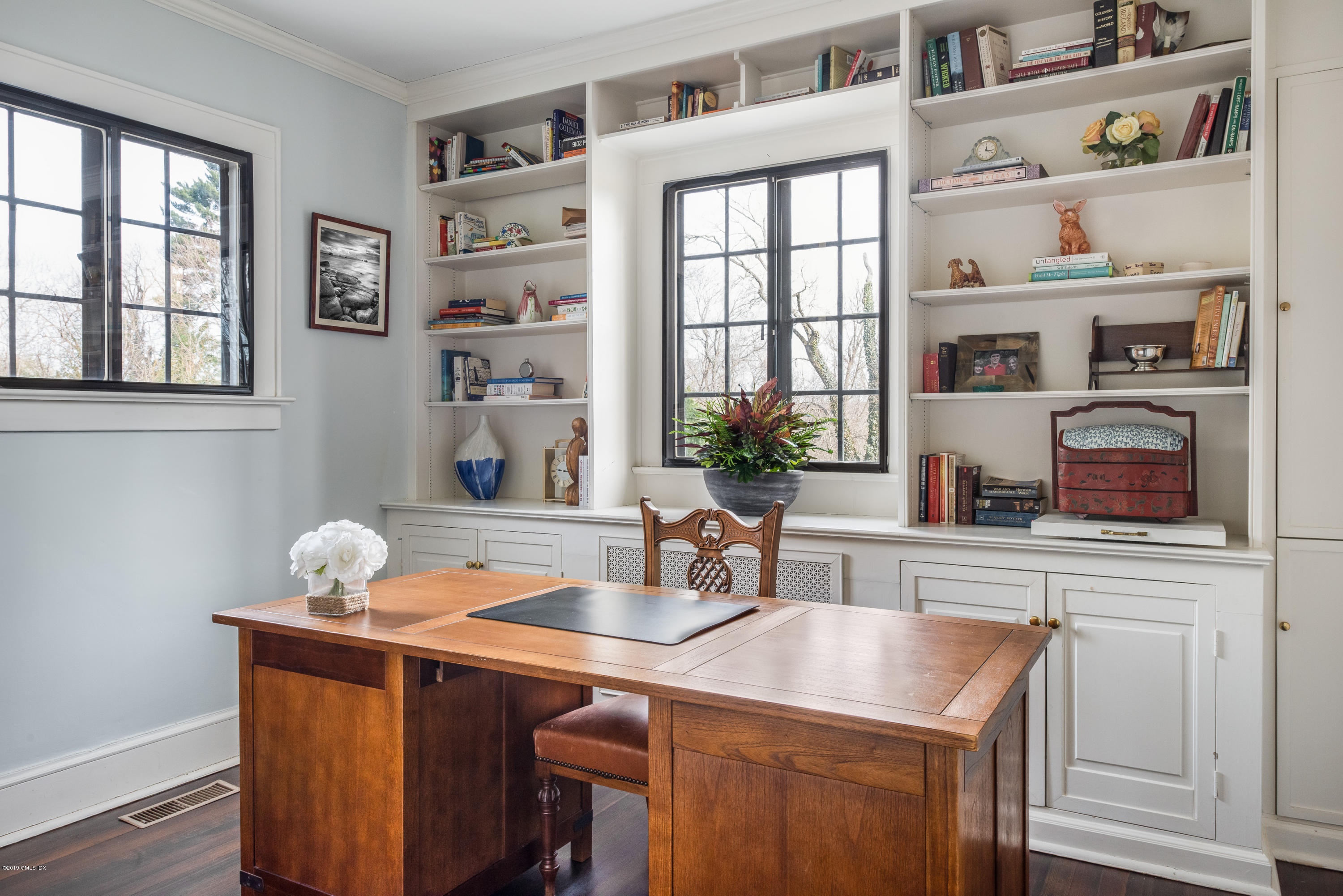 50 Upland Drive Greenwich, CT 06831 - Photo 20 of 34 a kitchen with a sink cabinets and a window