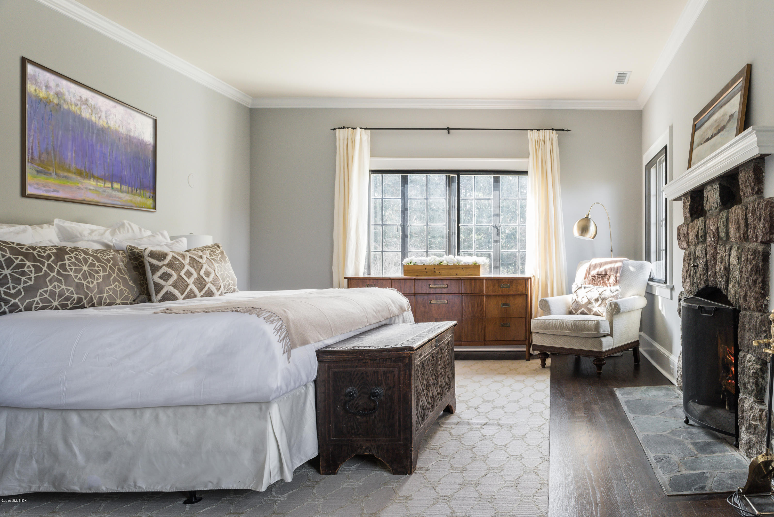 50 Upland Drive Greenwich, CT 06831 - Photo 22 of 34 a bedroom with a bed and a couch