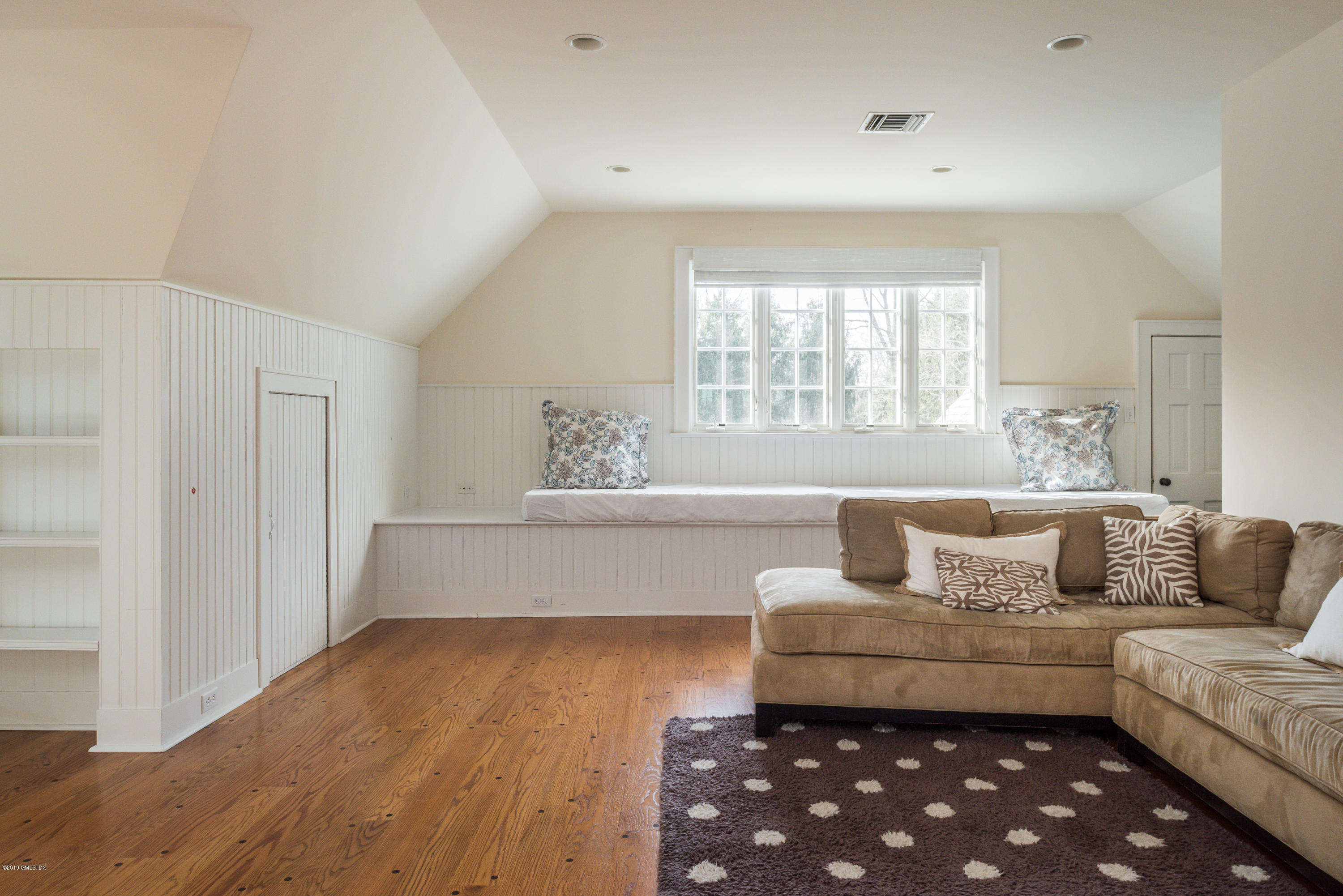 50 Upland Drive Greenwich, CT 06831 - Photo 30 of 34 a living room with furniture and a window