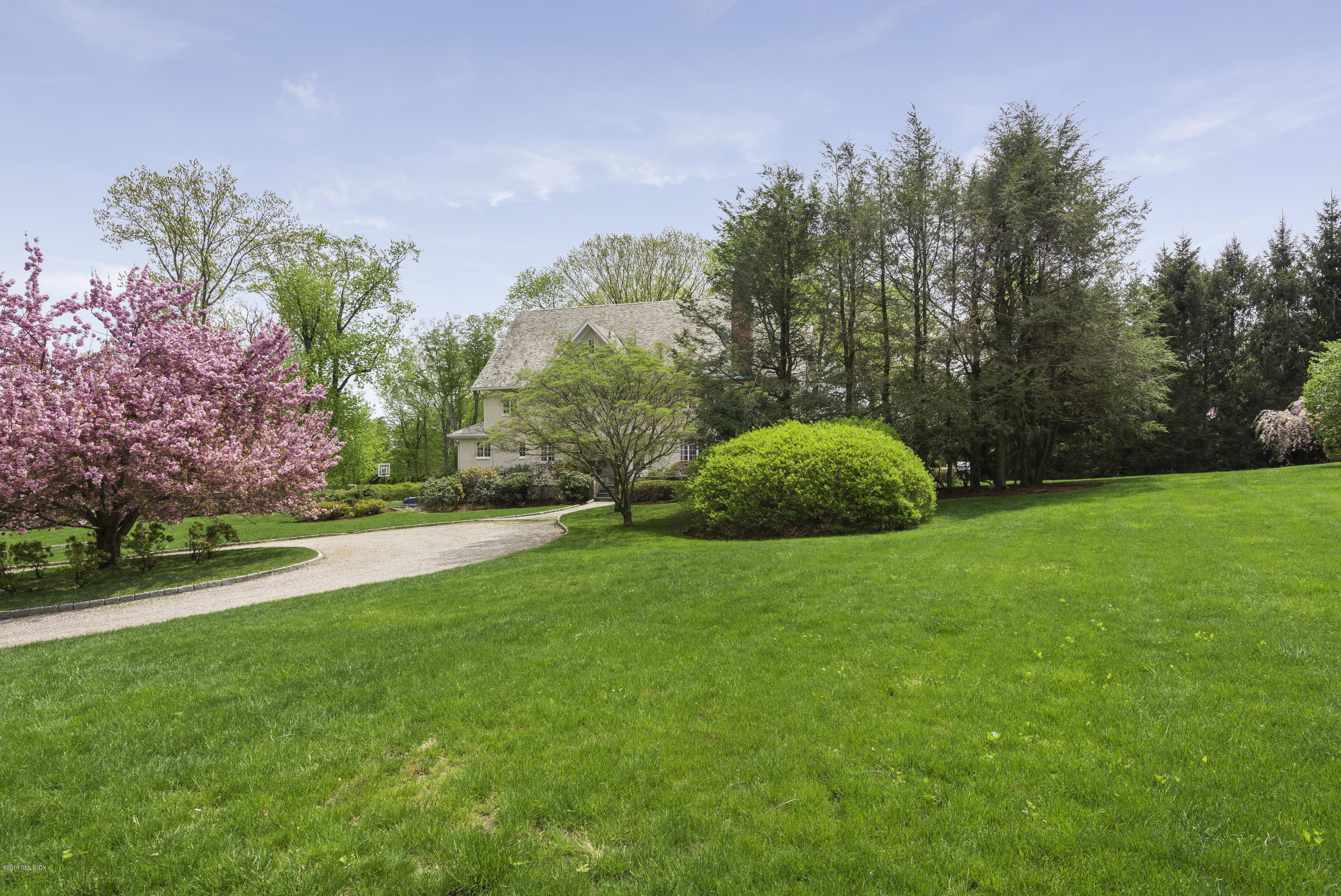 50 Upland Drive Greenwich, CT 06831 - Photo 5 of 34 a view of a outdoor space and a yard