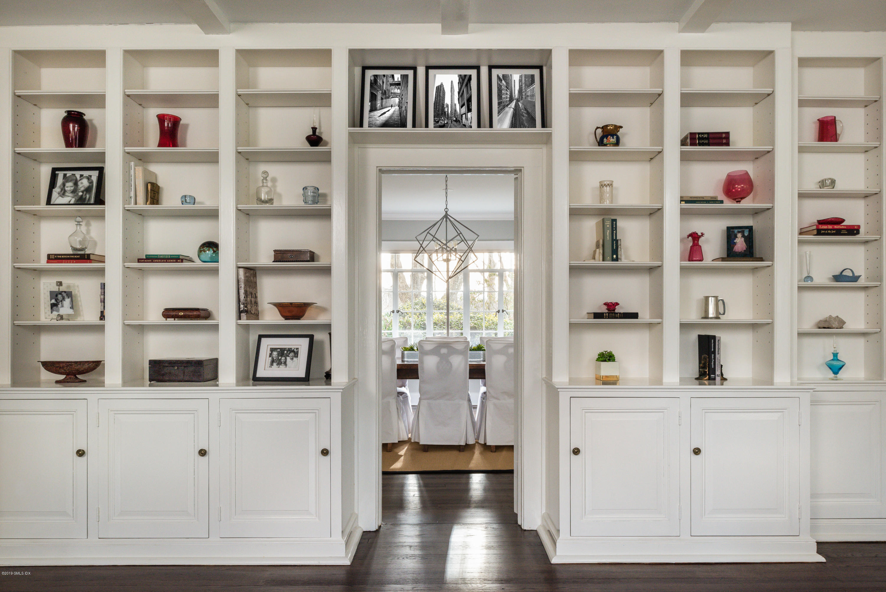 50 Upland Drive Greenwich, CT 06831 - Photo 10 of 34 a view of walk in closet with clothes and shoes