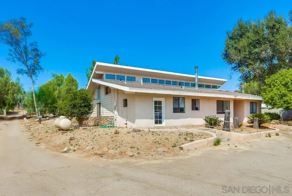 1729 Weekend Villa Road Ramona, CA 92065 - Photo 3 of 25 a front view of a house with a patio