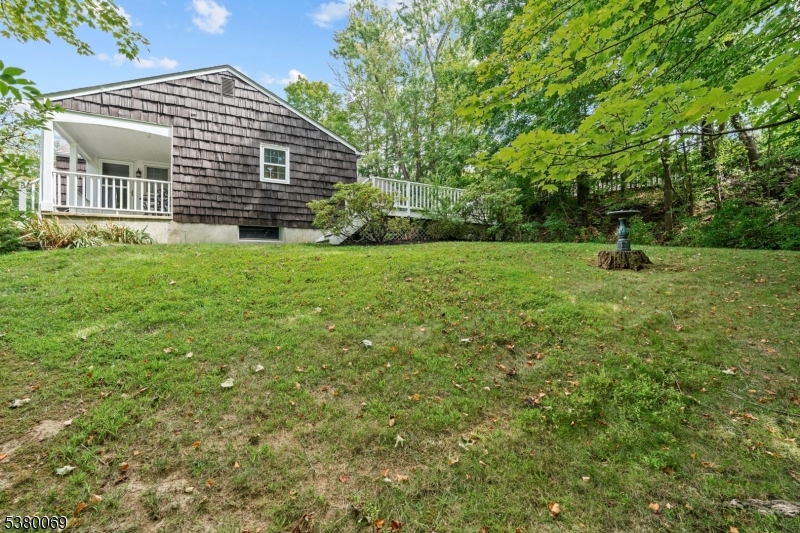 2 Bell Street Sparta, NJ 07871 - Photo 29 of 29 a view of a backyard with a garden