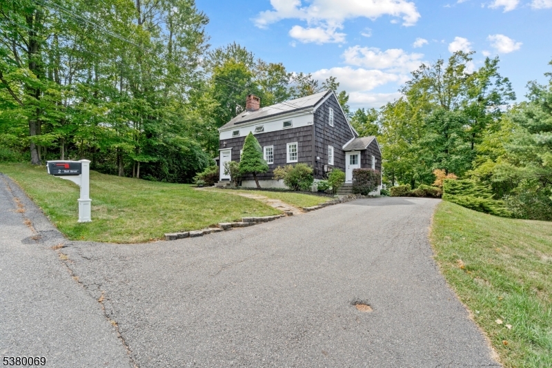 2 Bell Street Sparta, NJ 07871 - Photo 3 of 29 a view of a house with a yard and large tree