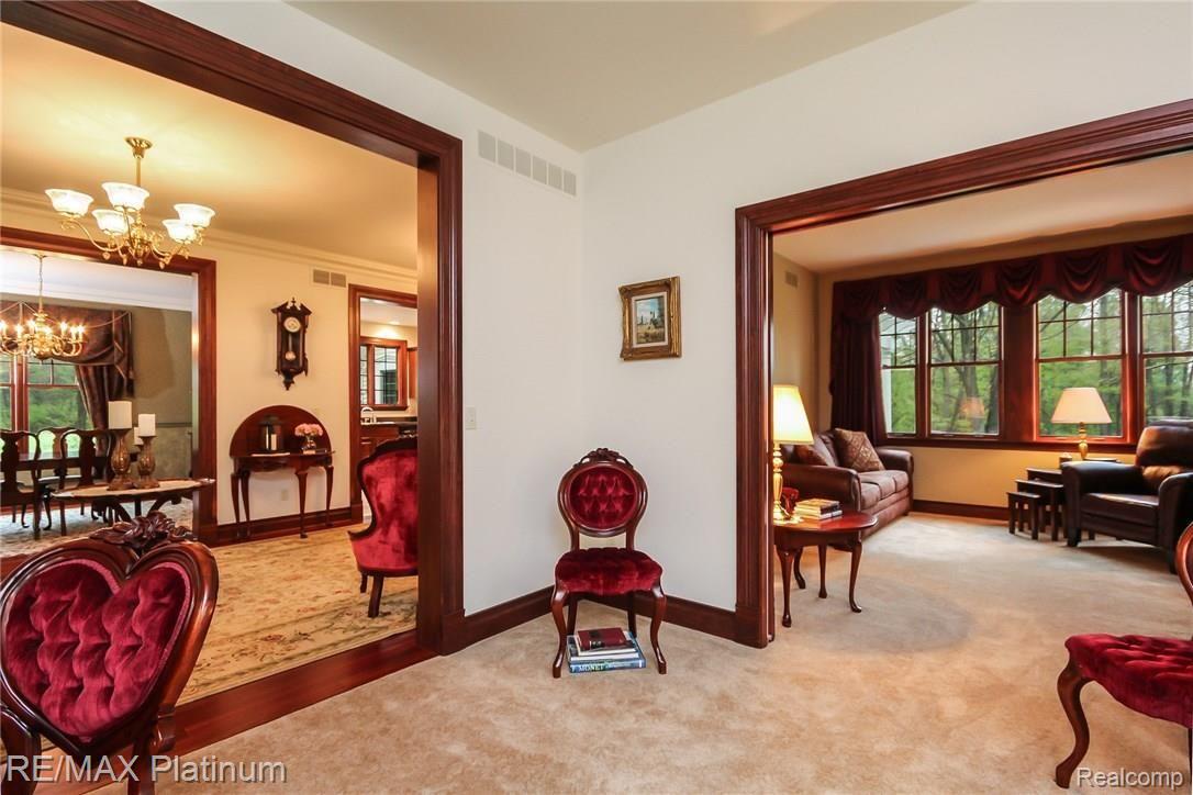 6945 Gawley Road Pinckney, MI 48169 - Photo 12 of 76 View from living room toward foyer, dining and family rooms