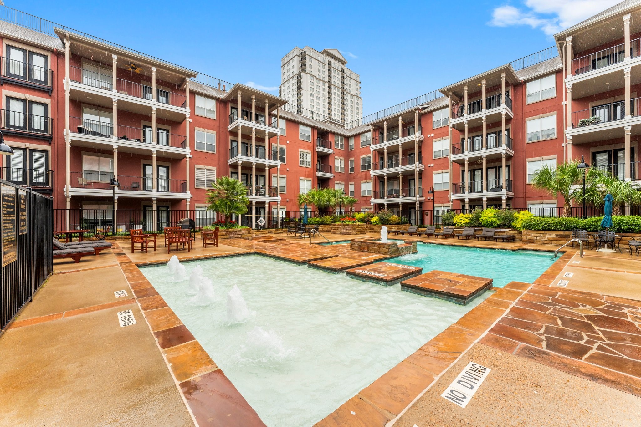 2400 McCue Road, Unit 237 Houston, TX 77056 - Photo 1 of 27 a building view with swimming pool in front of it