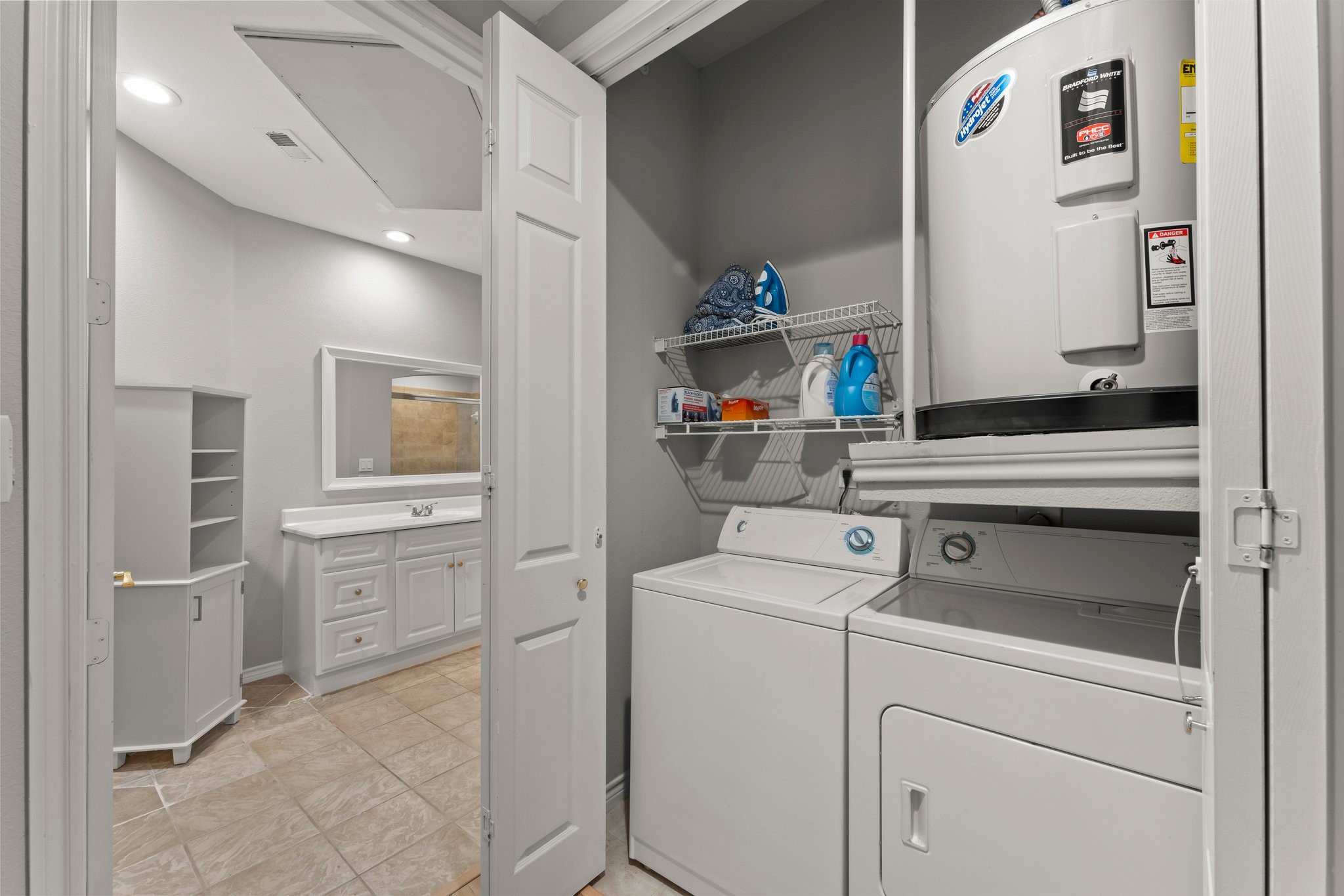 2400 McCue Road, Unit 237 Houston, TX 77056 - Photo 16 of 27 a room with storage and utility