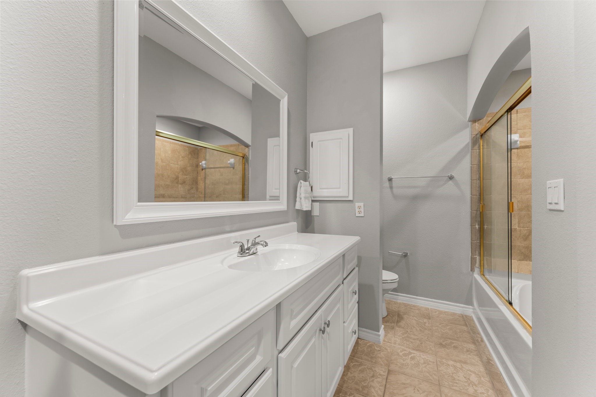 2400 McCue Road, Unit 237 Houston, TX 77056 - Photo 17 of 27 a bathroom with a sink a toilet and shower