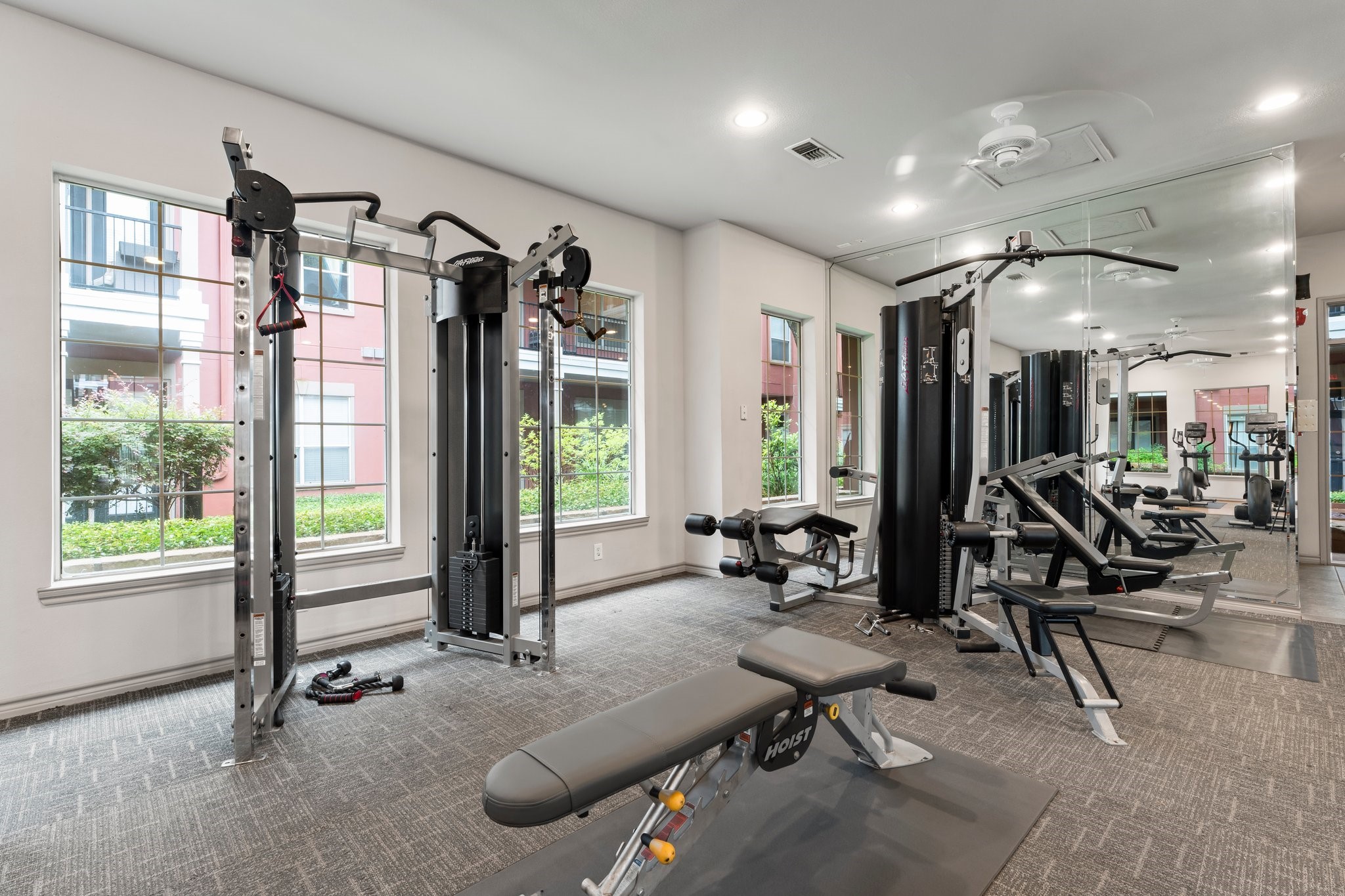 2400 McCue Road, Unit 237 Houston, TX 77056 - Photo 21 of 27 a view of a room with gym equipment