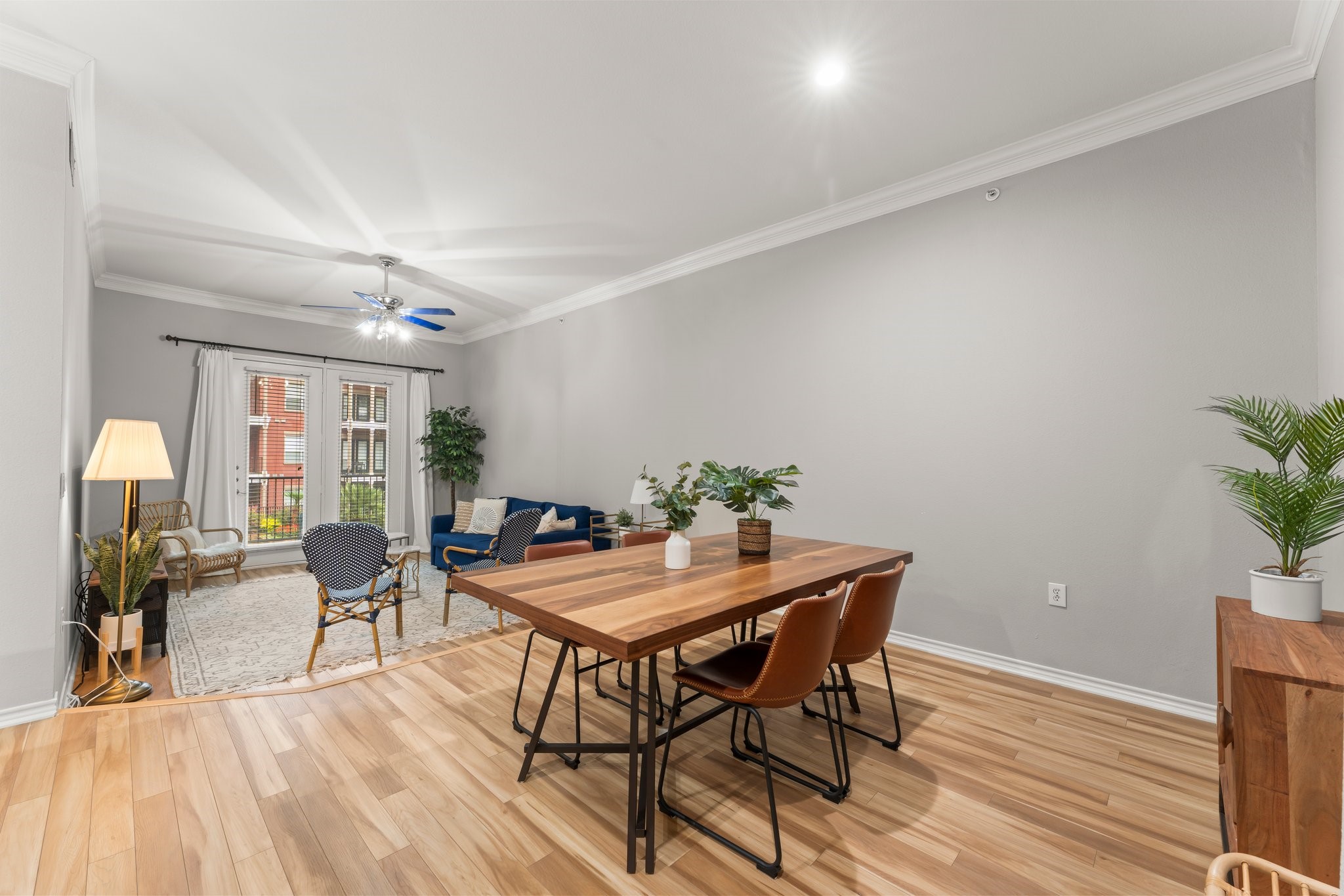 2400 McCue Road, Unit 237 Houston, TX 77056 - Photo 4 of 27 a dining room with furniture and wooden floor