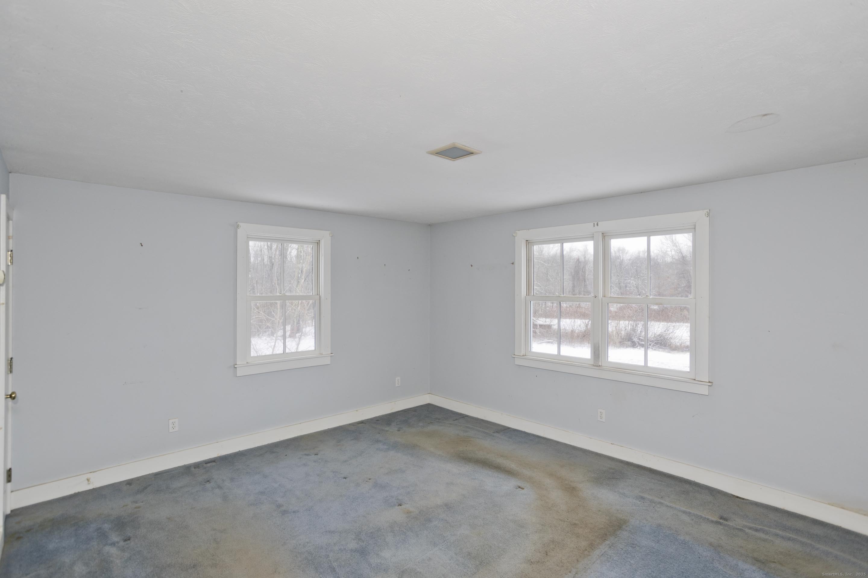 1095 South Grand Street Suffield, CT 06093 - Photo 12 of 31 a view of an empty room with a window