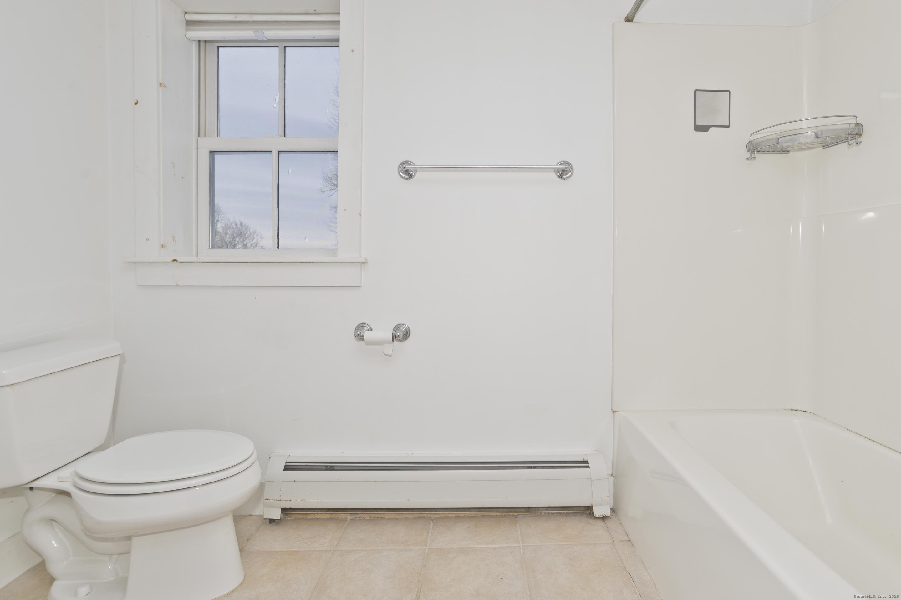 1095 South Grand Street Suffield, CT 06093 - Photo 18 of 31 a bathroom with a toilet and a bathtub