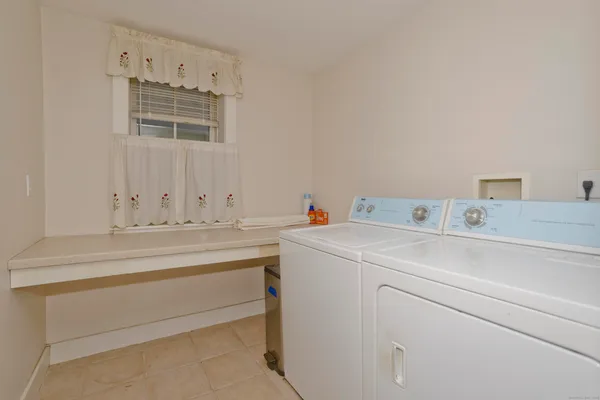 a view of a room with a large window