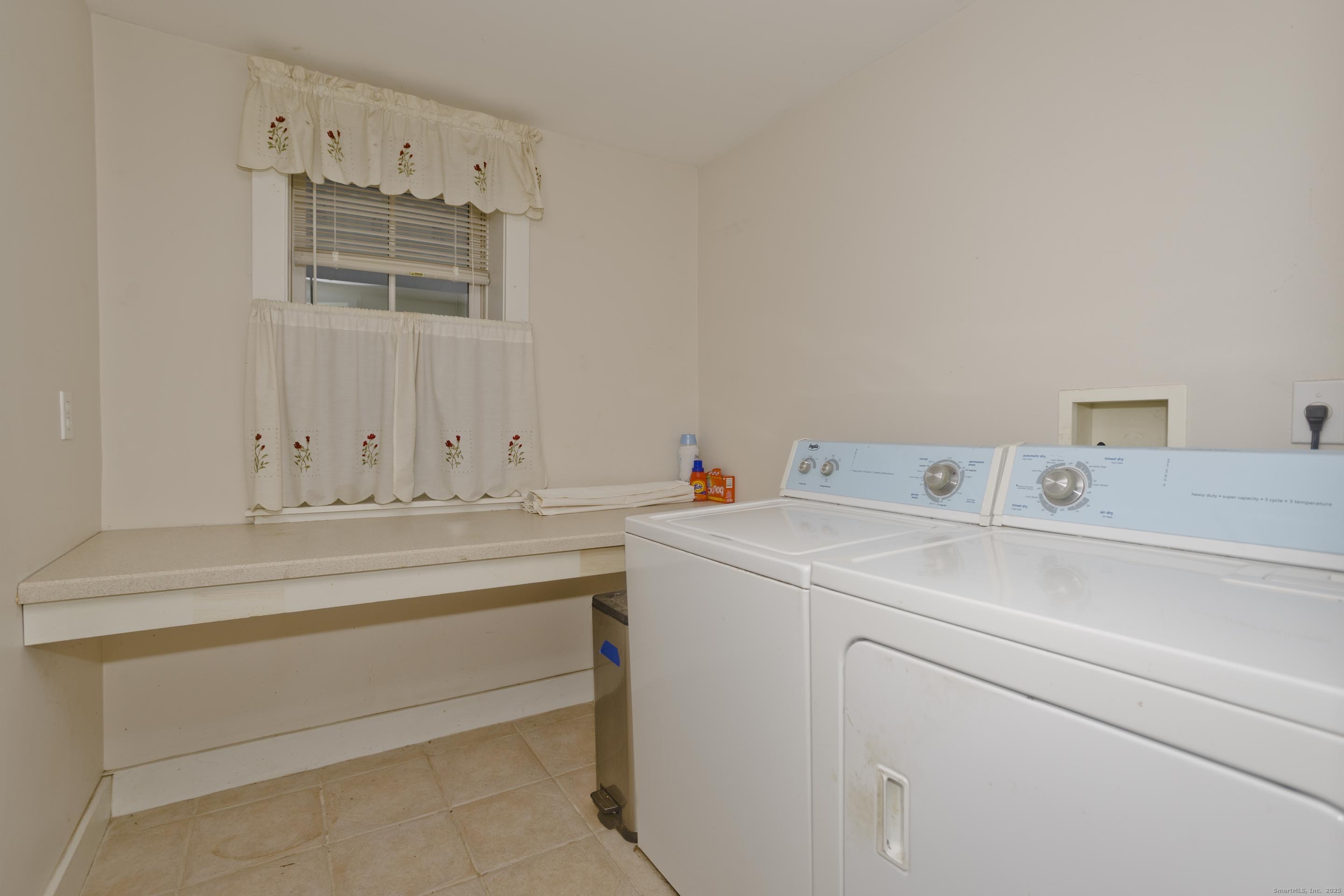 1095 South Grand Street Suffield, CT 06093 - Photo 10 of 31 a utility room with dryer and washer