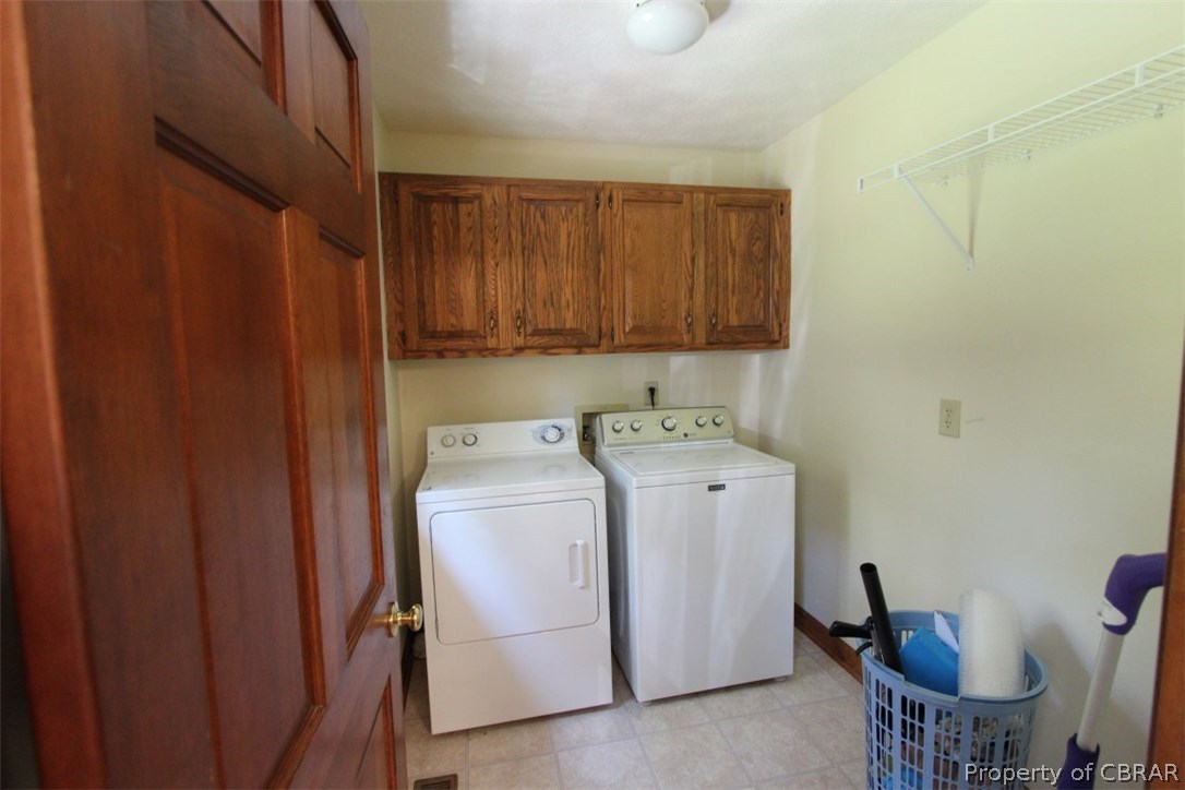 308 Tides Run Yorktown, VA 23692 - Photo 13 of 34 a utility room with dryer and washer