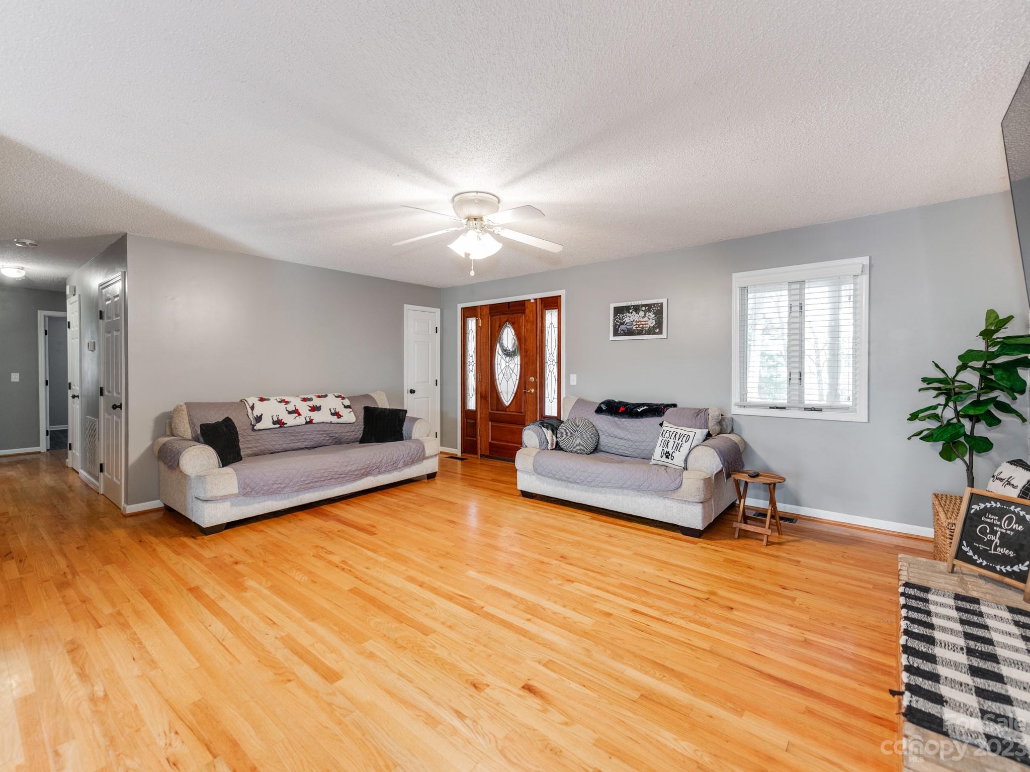 33702 Western Road Albemarle, NC 28001 - Photo 11 of 42 a living room with furniture and a large window