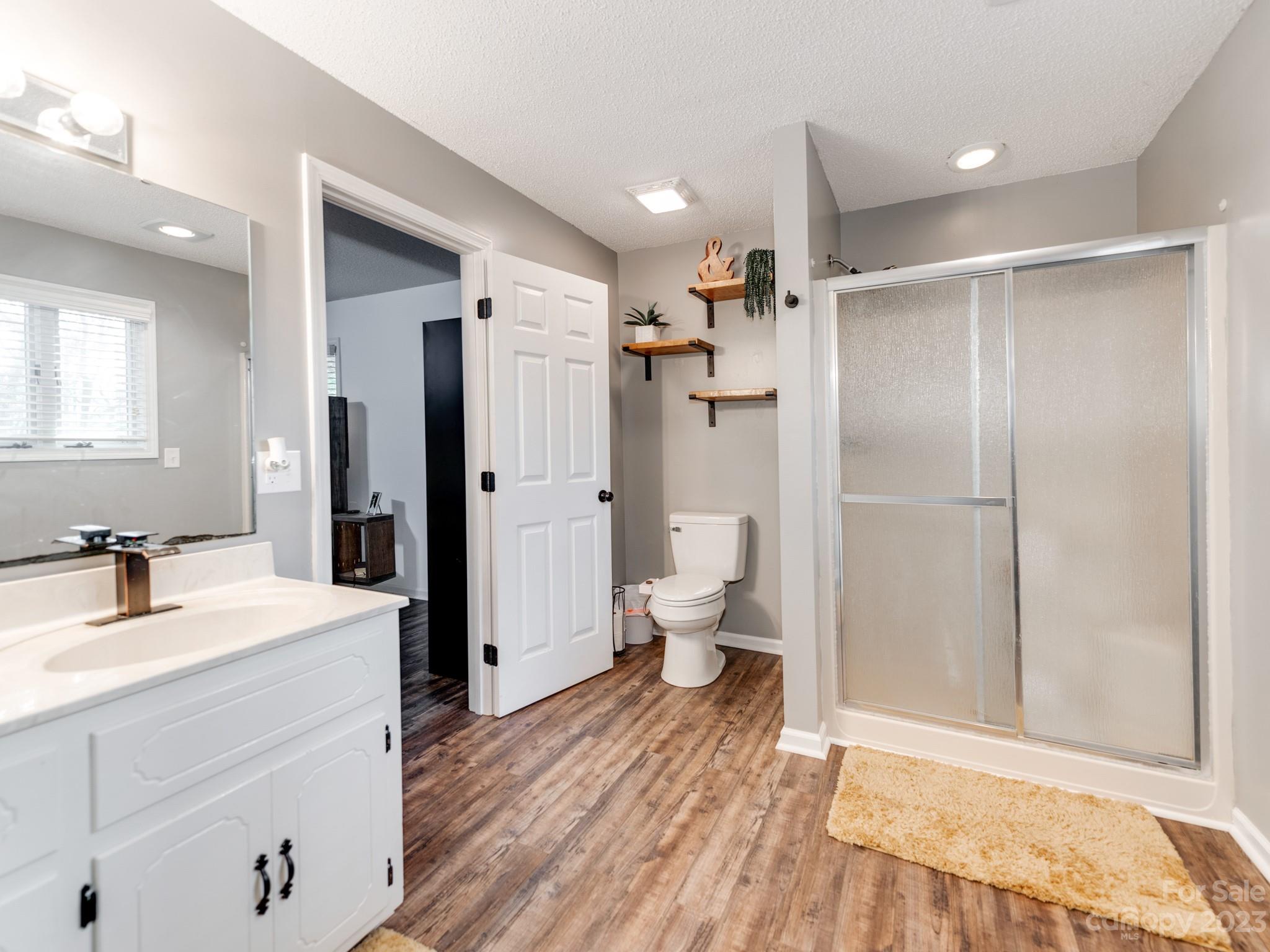 33702 Western Road Albemarle, NC 28001 - Photo 20 of 42 a bathroom with a sink and a mirror