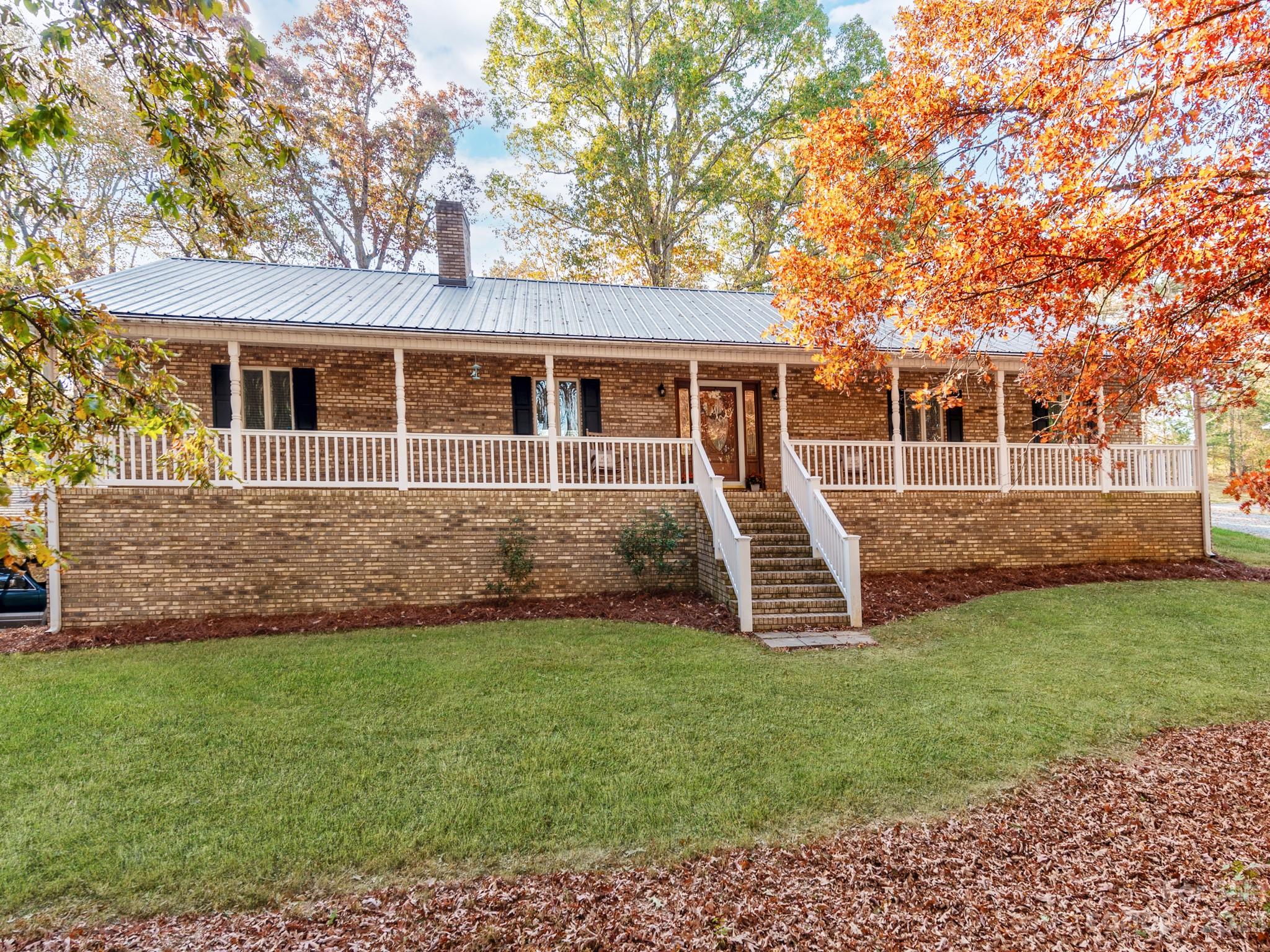 33702 Western Road Albemarle, NC 28001 - Photo 2 of 42 front view of a house with a yard