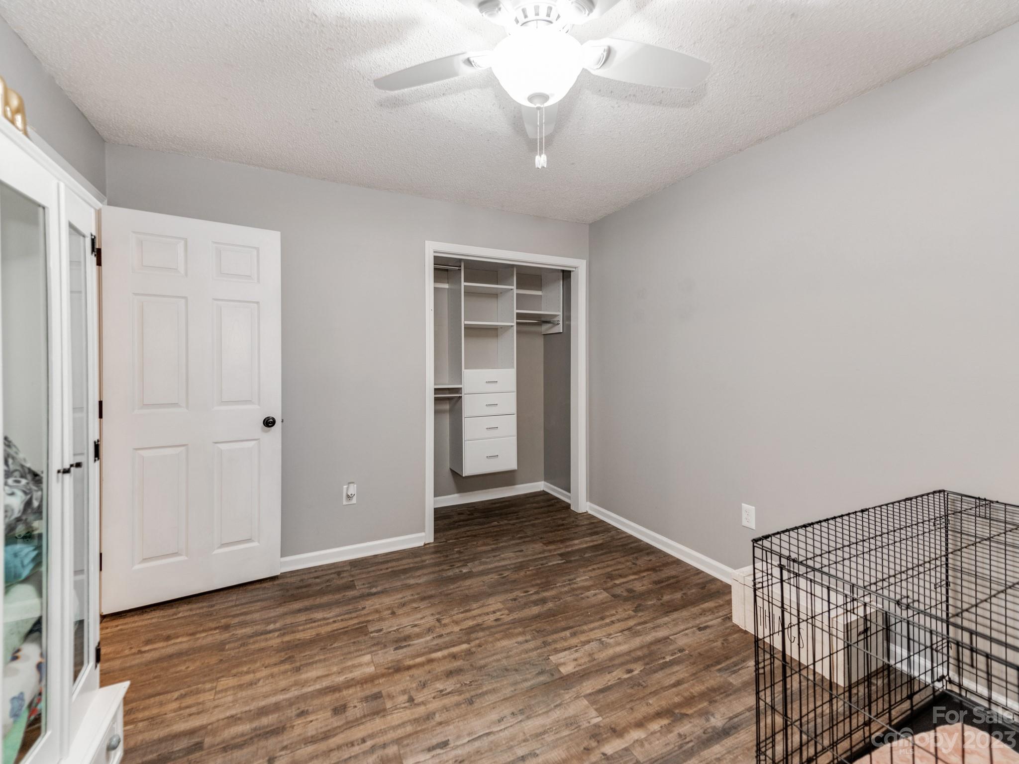 33702 Western Road Albemarle, NC 28001 - Photo 25 of 42 a view of an empty room with wooden floor