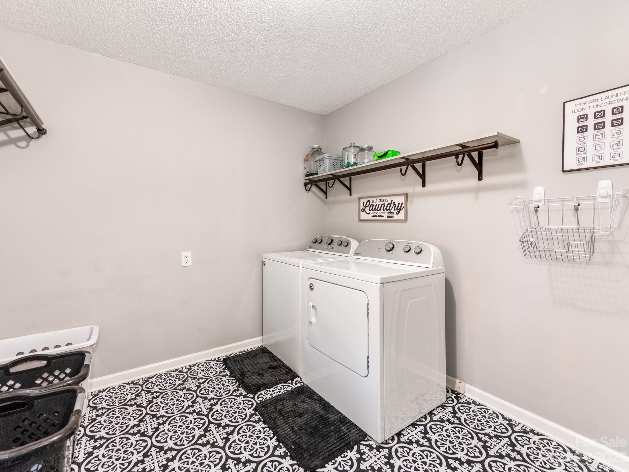 33702 Western Road Albemarle, NC 28001 - Photo 27 of 42 a utility room with a sink dryer and washer
