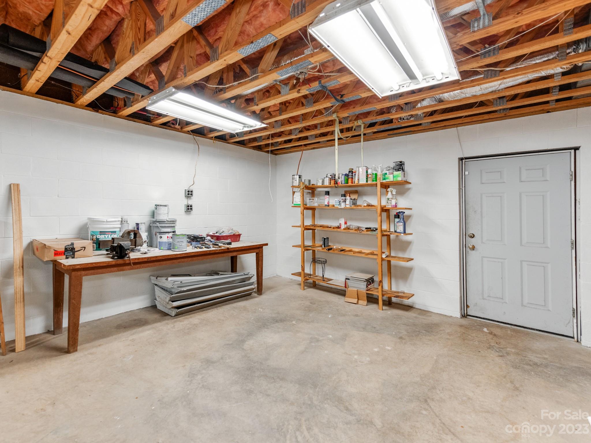 33702 Western Road Albemarle, NC 28001 - Photo 30 of 42 a view of a storage room with cabinets
